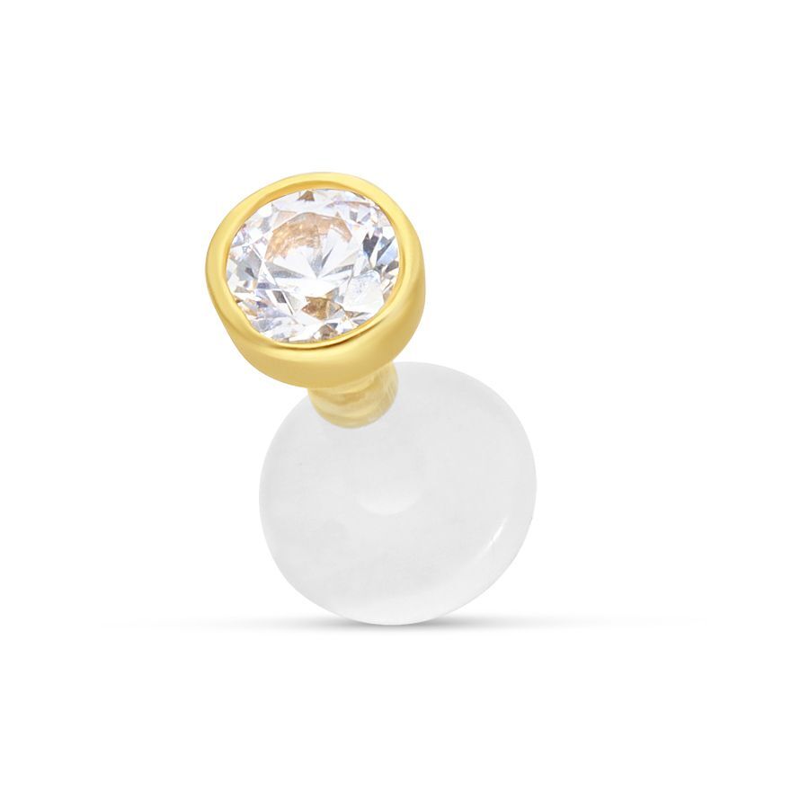 Goldener Labret mit klarem Kristall auf weißem Hintergrund