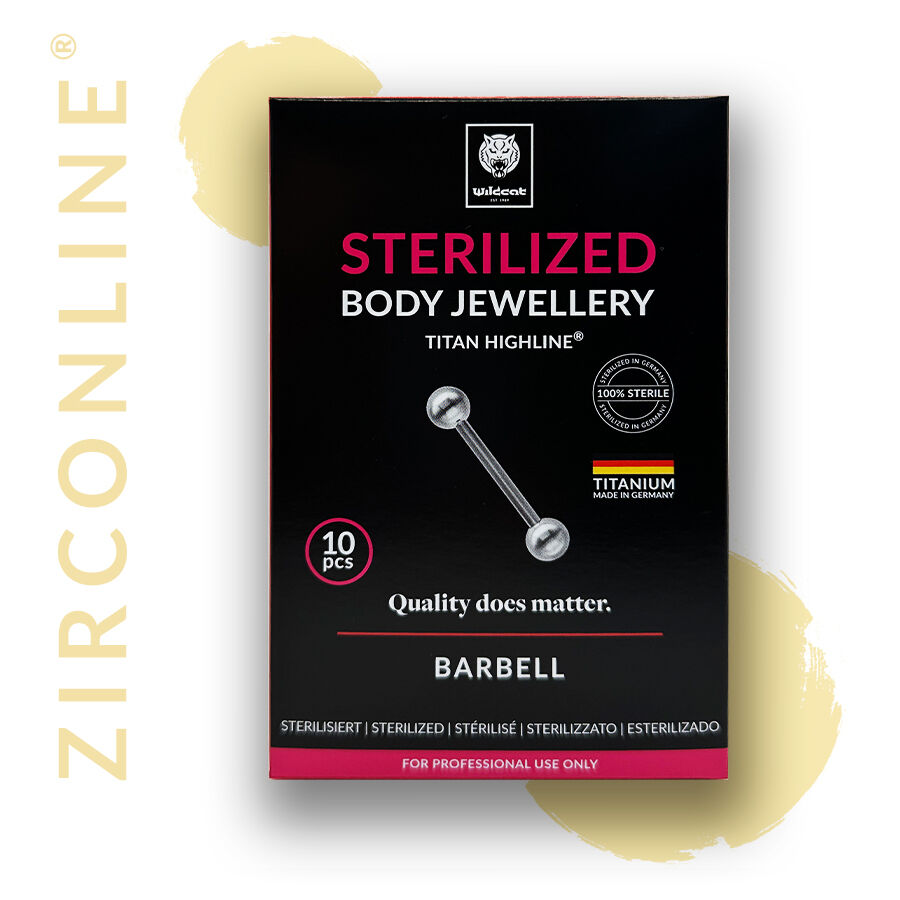 Goldener Micro Barbell aus Titan auf schwarzem Hintergrund, Verpackung sichtbar