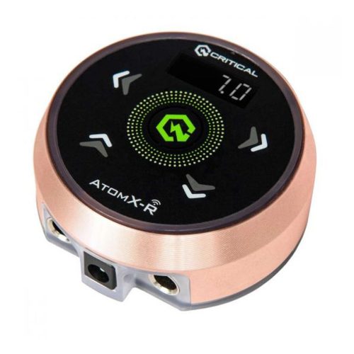 Rundes Atomxr Netzteil in Roségold mit schwarzer Oberfläche und Display