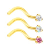 Drei goldene Nasenstecker mit klaren, Aurora Boreale und rosa Kristallen auf weißem Hintergrund