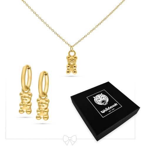 Goldene Halskette und Ohrringe mit Gummi Bär Anhängern auf weißem Hintergrund