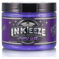 Lila Tattoocreme-Dose mit Ink Eeze Logo auf weißem Hintergrund