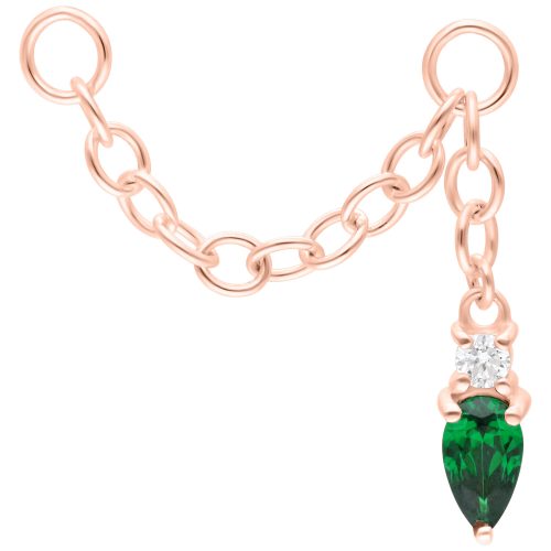 Roségoldene Kette mit smaragdgrünem Kristall und Anhänger auf weißem Hintergrund