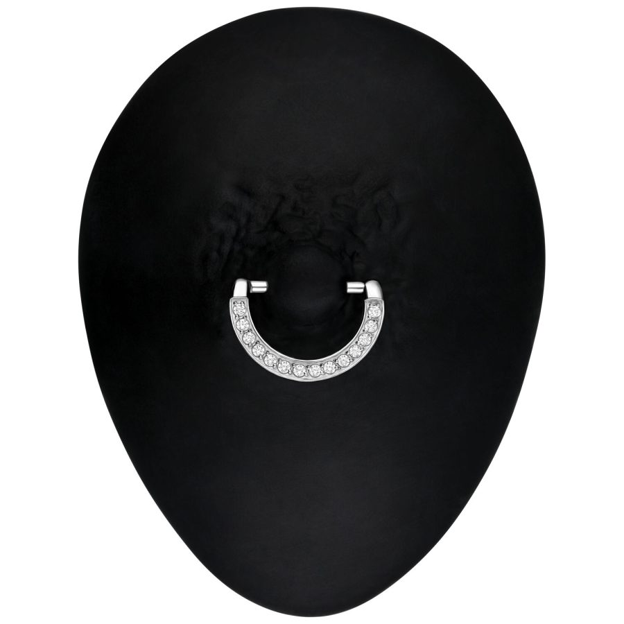 Silberner Nipple Clicker mit funkelnden Kristallen auf schwarzem Hintergrund