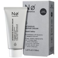 Graue Tube der No Cosmetics Intensiv Repair Cream neben grauer Verpackung