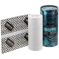 Tattoo Folie Rolle und Verpackung im Onyx Design auf weißem Hintergrund