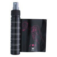Piercingspray Flasche und Anleitung mit Zeichnung auf weißem Hintergrund