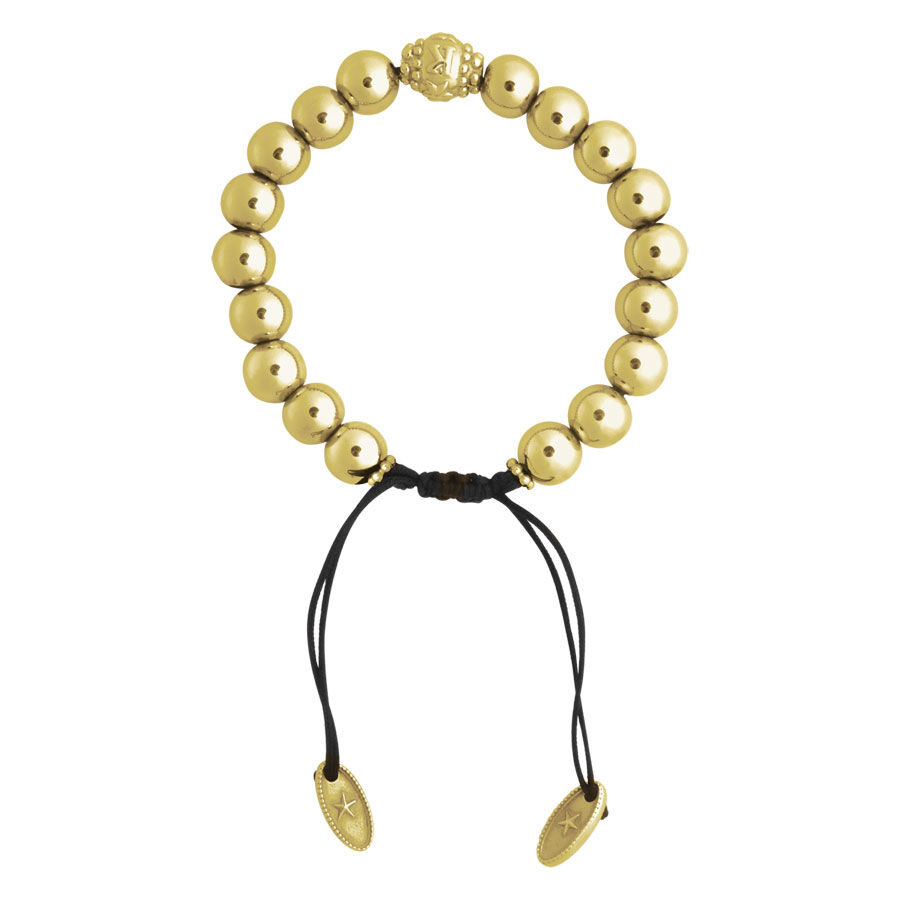 Goldenes Armband mit runden Perlen und schwarzem Band auf weißem Hintergrund