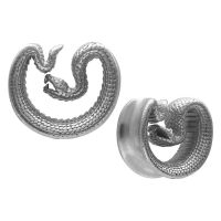 Zwei schwarze Ear Saddles in Schlangenform auf weißem Hintergrund