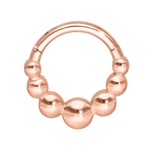 Roségoldener Piercingring mit Kugeln auf weißem Hintergrund
