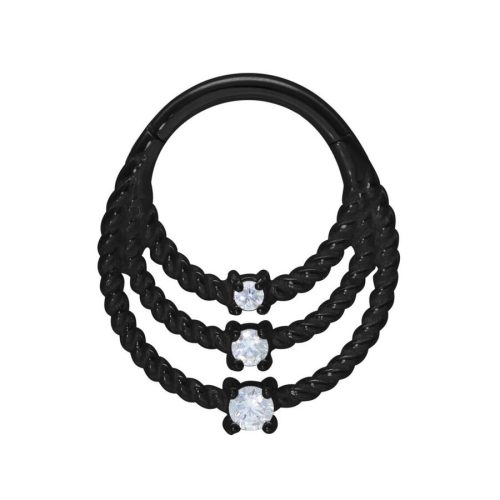 Dreifacher schwarzer Twisted Ring mit klaren Kristallen auf weißem Hintergrund