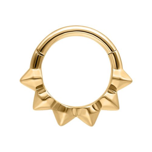 Goldener Septum Clicker mit spitzen Stacheln auf weißem Hintergrund