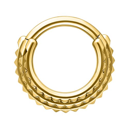 Goldener Septum Clicker mit dreifachen Spikes auf weißem Hintergrund