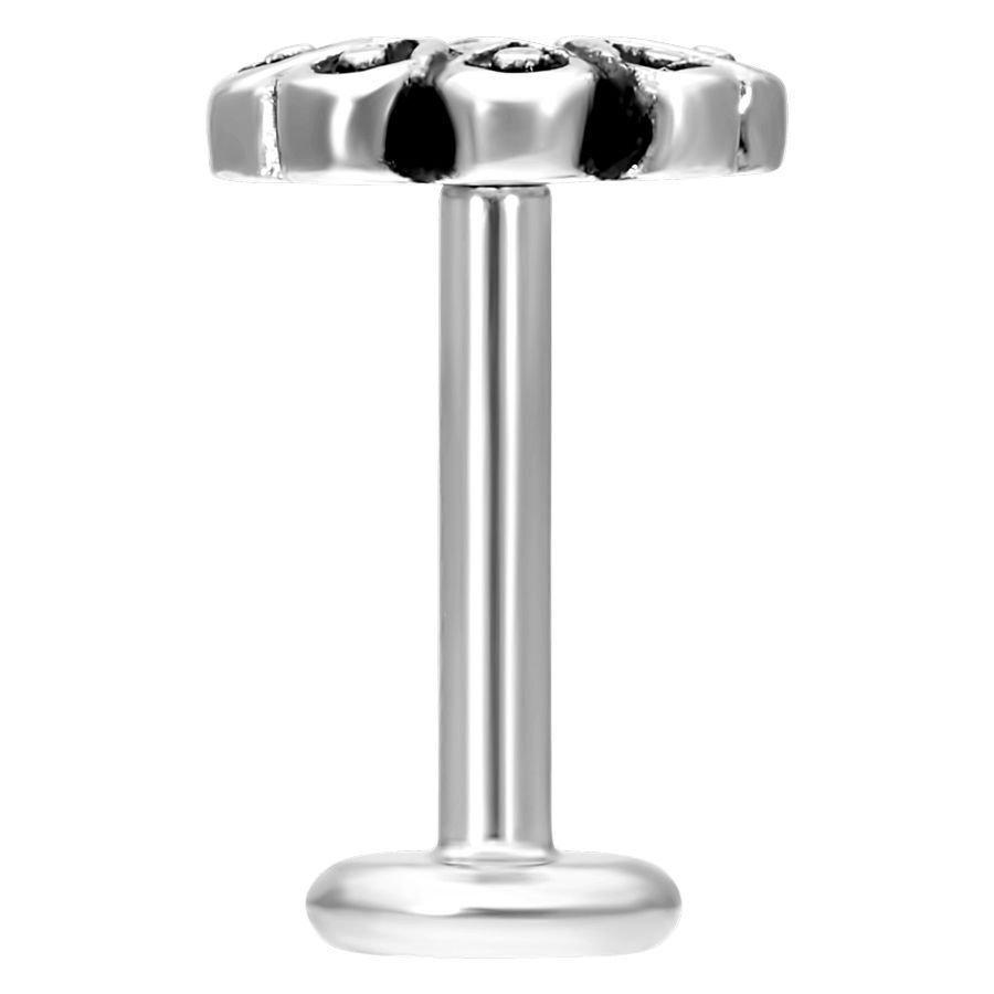 Silbernes Labret mit Blütenkopf auf weißem Hintergrund