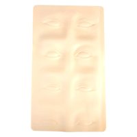Beige Silikonplatte mit Augenbrauenkonturen auf weißem Hintergrund