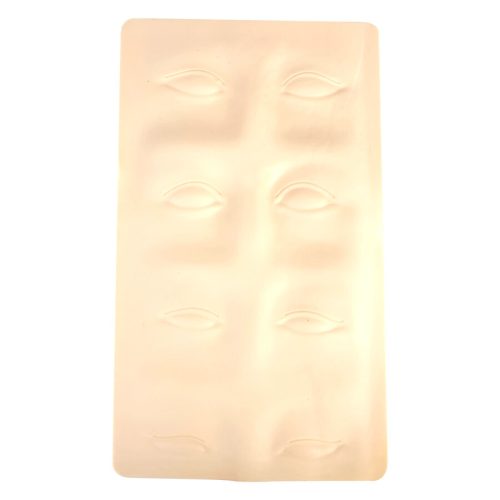 Beige Silikonplatte mit Augenbrauenkonturen auf weißem Hintergrund