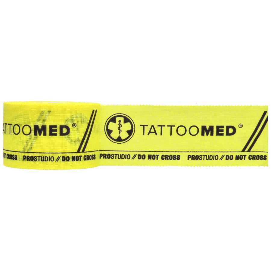 Gelbes Tattoomed Studio Pro Tape mit schwarzem Aufdruck auf weißem Hintergrund