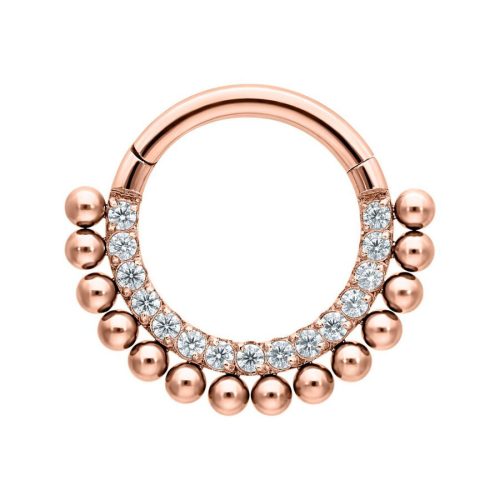 Roségold Clicker Piercing mit klaren Kristallen auf weißem Hintergrund