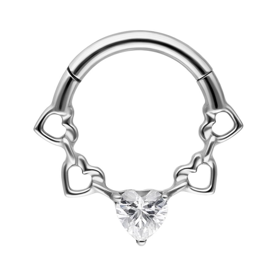 Silberner Septum Clicker mit Herz- und Kristalldetails auf weißem Hintergrund