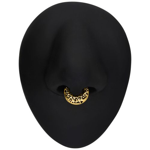 Goldener Septum Clicker mit Leopardenmuster auf schwarzem Hintergrund