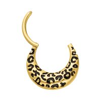 Goldener Septum Clicker mit Leopardenmuster auf weißem Hintergrund